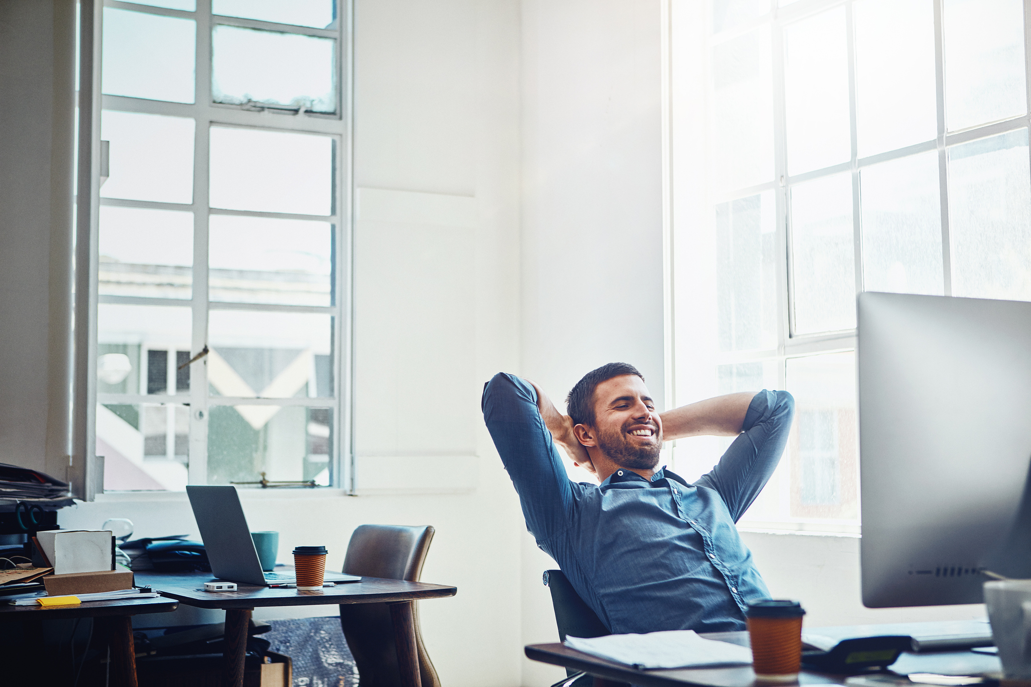 Man Looking At Happy Email