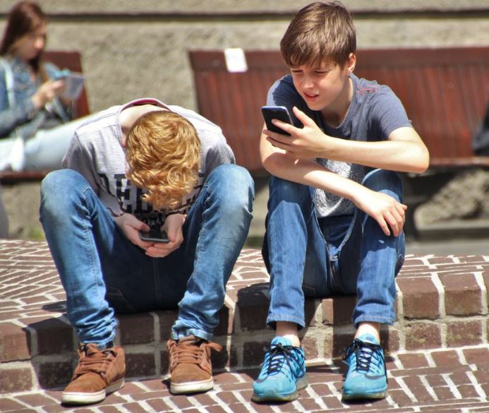 Boys with phones