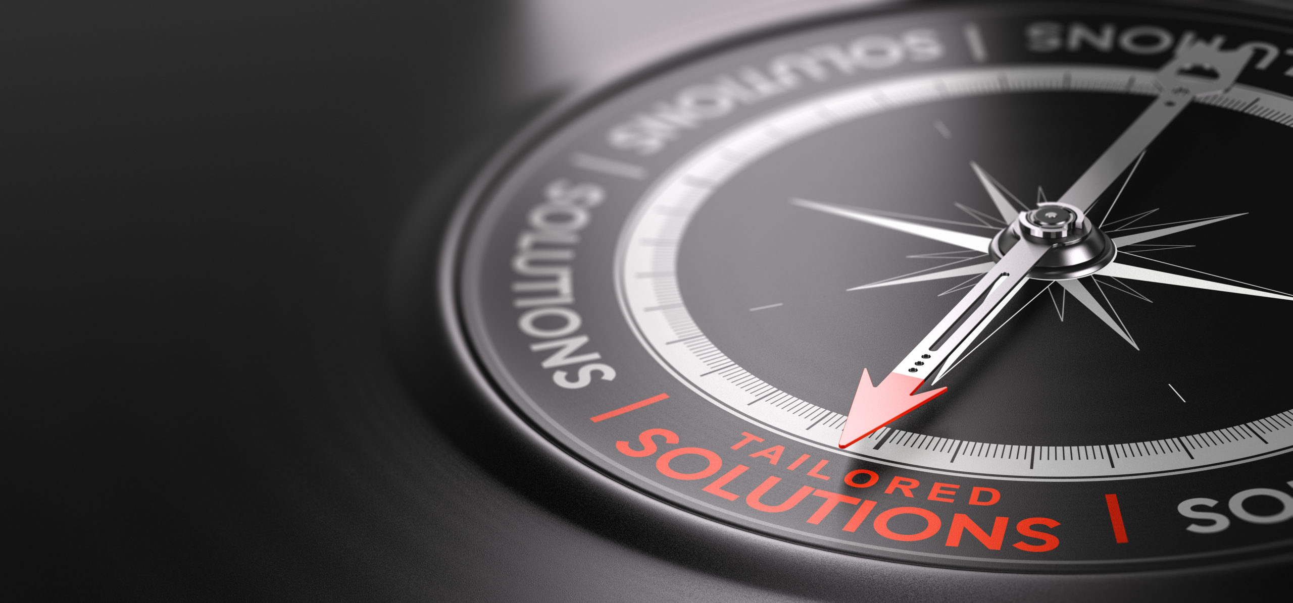 3D illustration of a compass over black background with the text tailored solutions written in red. Made-to-measure services concept.