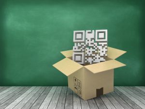 Cardboard Box with QR Code on Wood Floor - Chalkboard Background - 3D Rendering