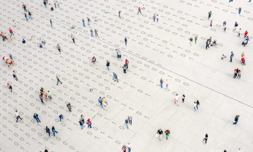 Crowd walking over binary code