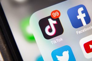 TikTok and Facebook application on screen Apple iPhone XR