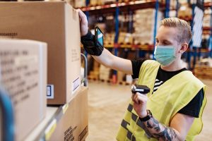 Essential workers in service and delivery industry with face mask during covid-19 pandemic