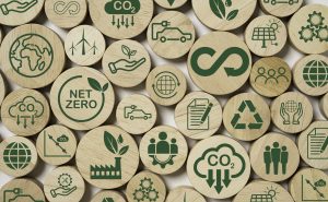 infinity and Circular business economy environment icons print screen on wooden for future sustainable investment growth and reduce environmental pollution concept.