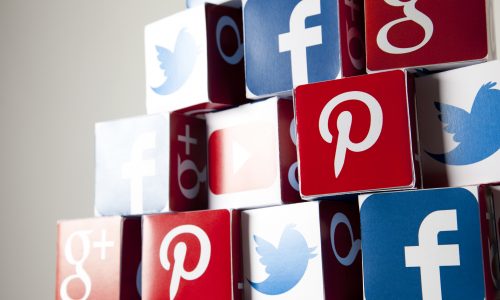 Facebook, YouTube, X, Pinterest and Google Plus logos printed onto handmade cubes