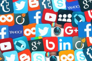 Background of social media icons: Facebook, Twitter, Blogger, LinkedIn, Tumblr, Myspace