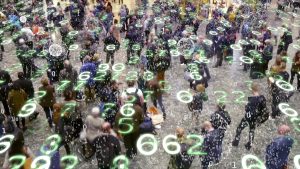 Binary code bursts from phones held by people with a matrix style overlay of glowing electronic numbers.