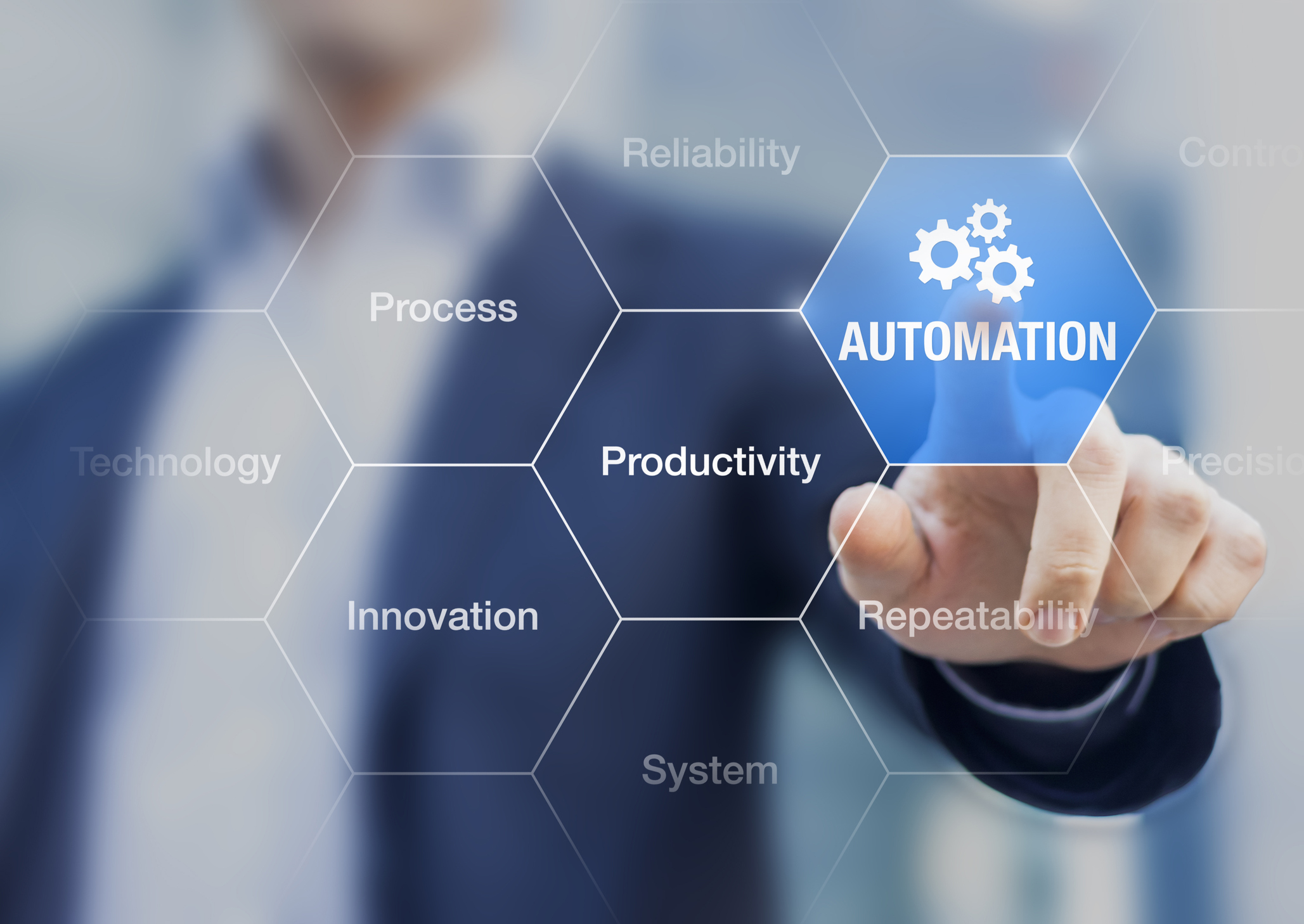 Businessman touching automation button in business automation concept.