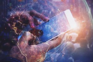 Woman hand holding cellphone. Double exposure with crowded city and world network.